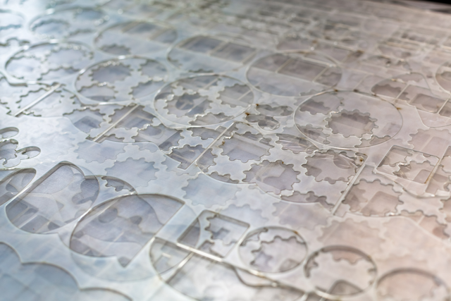 Precision laser cutting of acrylic sheet